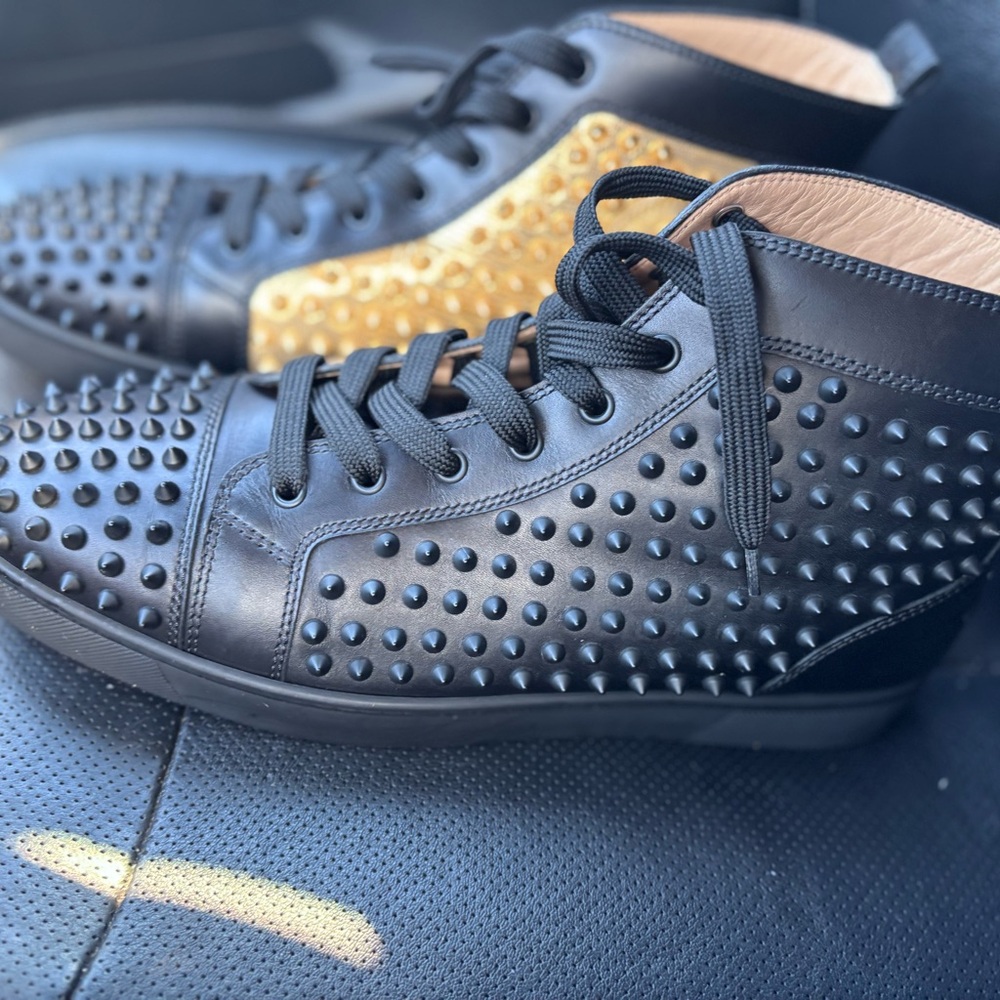 Christian Louboutin Black and Gold Studded Sneakers